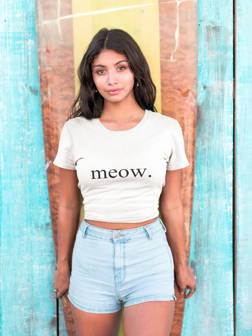 model wearing white t-shirt with black cat fun design
