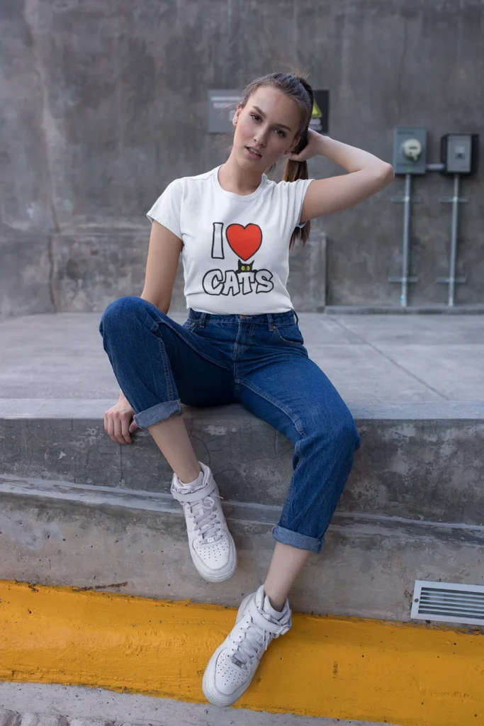 model wearing white t-shirt with black cat fun design