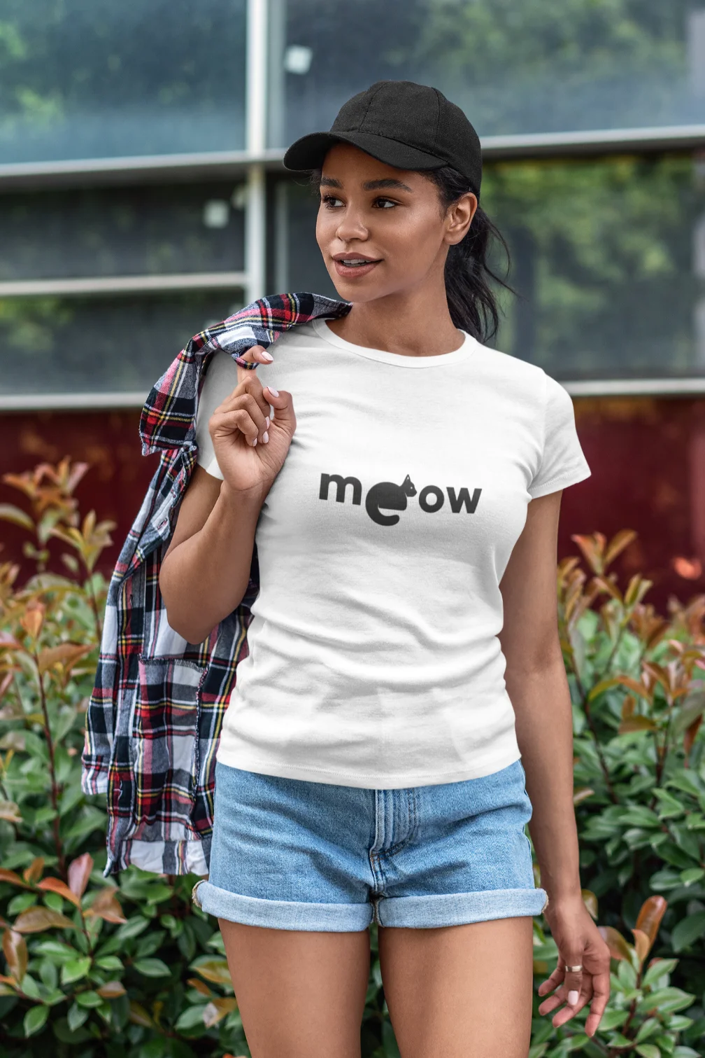 model wearing white t-shirt with black cat fun design meow