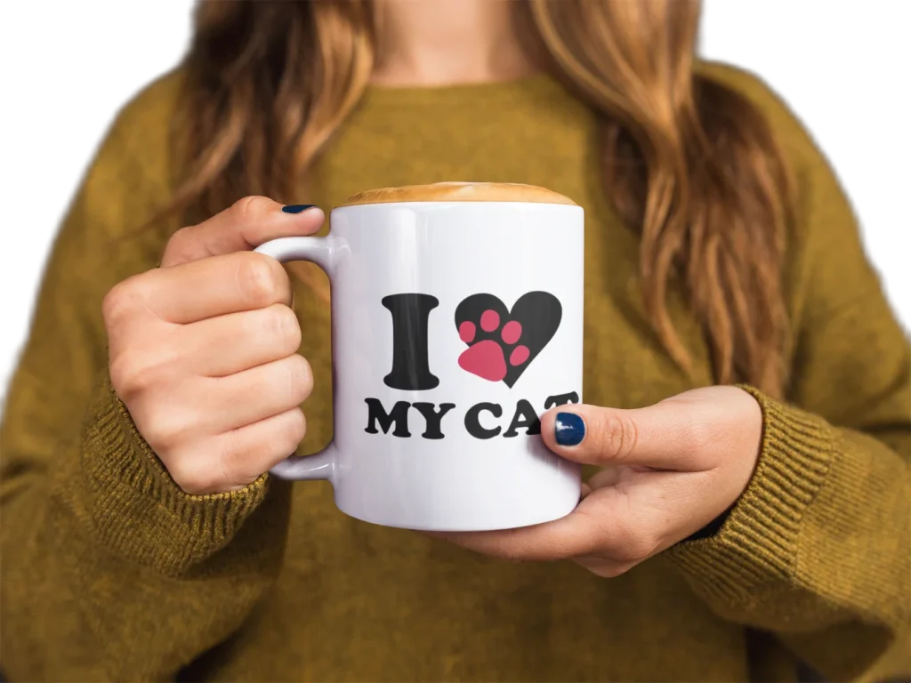 model holding white mug with fun void cat design